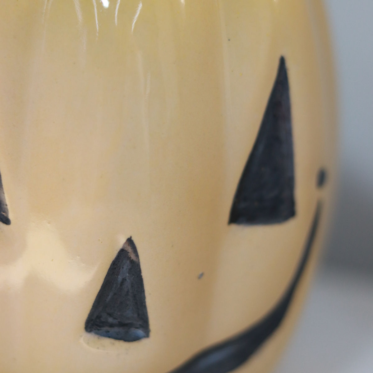 evil pumpkin mug in yellow