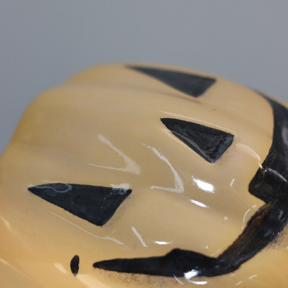 evil pumpkin mug in yellow