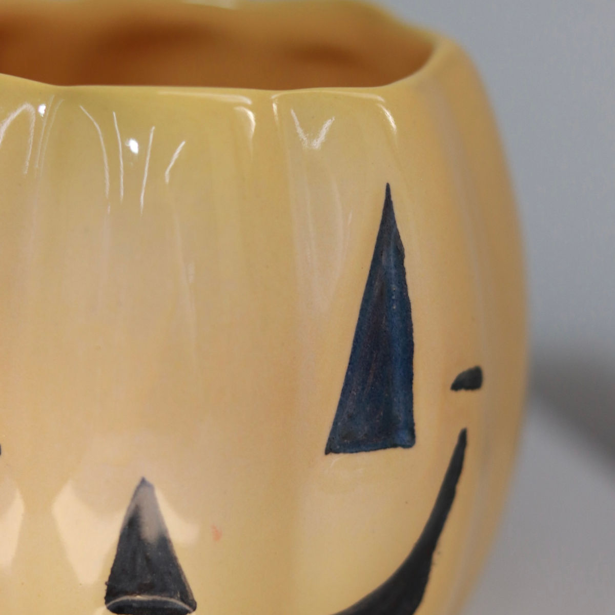 evil pumpkin mug in yellow